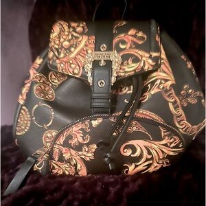 Versace black & gold backpack with adjustable straps. Nwot